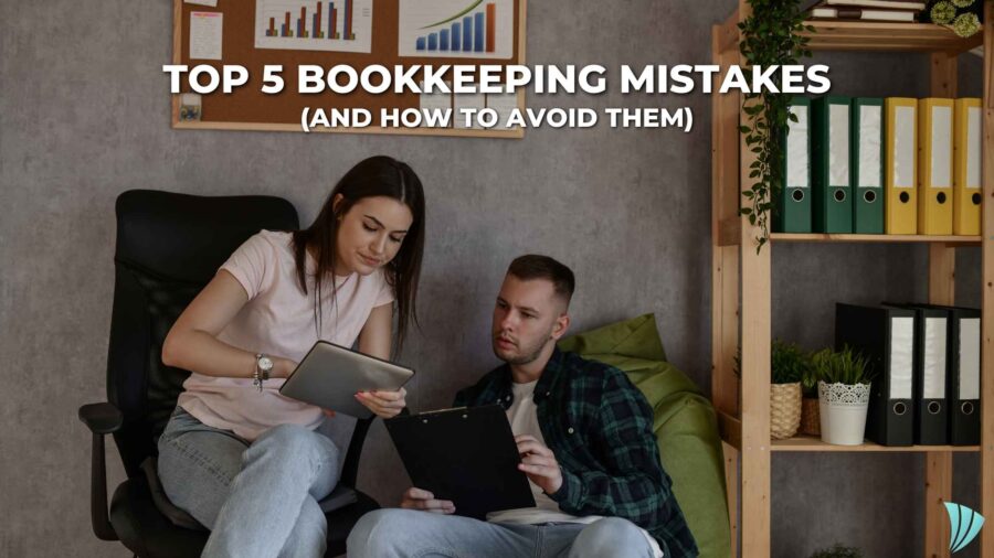 Business team reviewing financial records to avoid bookkeeping mistakes.